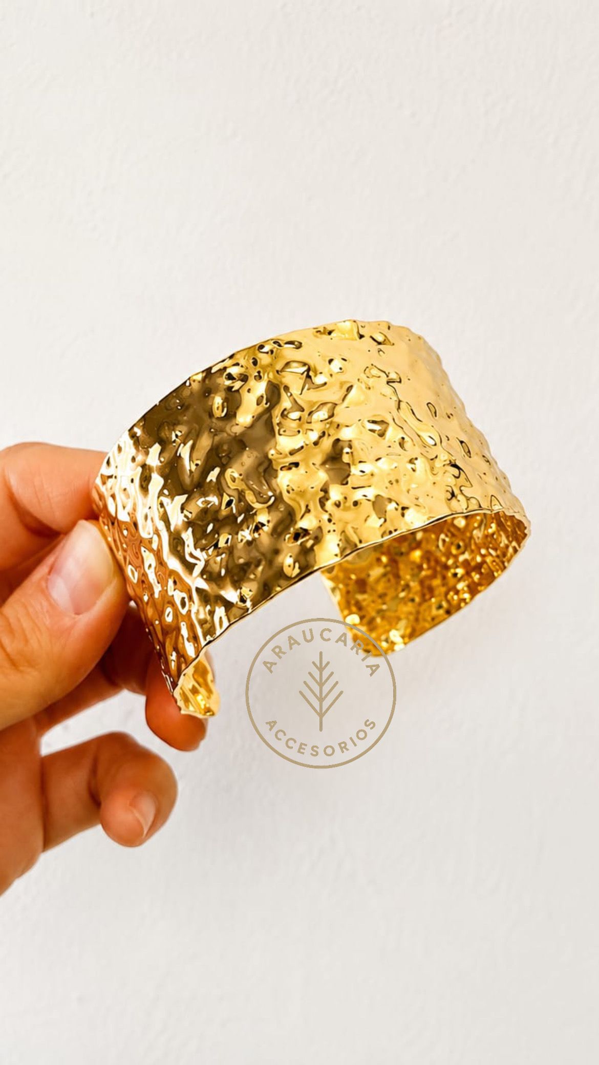 Esclava Alex en acero dorado